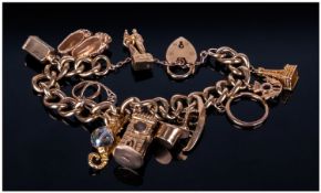 9ct Gold Vintage Curb Bracelet, loaded with 10 charms & padlock. All marked 9.375. 50.1 grams