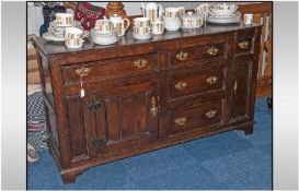 Antique Oak Welsh Dresser & Rack with two cupboards below, with three central drawers & two side