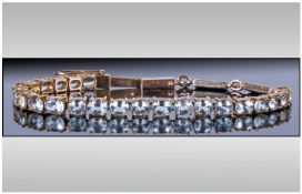 High Carat Gold Aquamarine Tennis Bracelet Set With 23 Oval Cut Aquamarines, Approximately .60