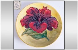 Moorcroft Hibiscus Pin Dish, small circular shallow dish with a single hibiscus flower in Burgundy