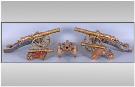 Five Brass Canons On Wood Carriages, one pair with cast barrels with Dutch crest on a brass mounted