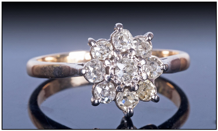 18ct Gold Set Diamond Cluster Ring, flower head setting, the central diamond surrounded by 8