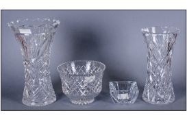 Four Pieces of Good Quality Glass Comprising two vases with star cut bases and one with a fluted