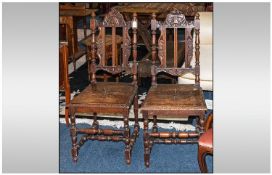 Pair Late 19th Century Carved Oak Hall Chairs with Carving to the Top Rail, Turned Back Supports,