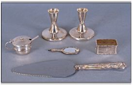 A Good Collection Of Silver Items Comprising A pair of squat candlesticks, 3`` in height,silver