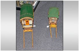Two Handmade Travellers Caravan Models, painted and decorated and of realistic form. One large, one