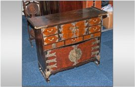 Oriental Brass Mounted Medicine Chest Of Unusual Form the top with scroll ends and the front fitted