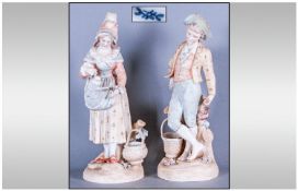 Pair of German Bisque Figures, One depicting a boy standing by tree stump with bird and basket, the