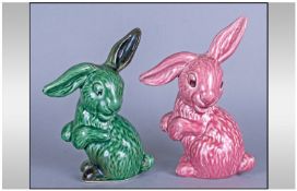 Pair Of Sylvac Rabbits, one green one pink. Each 8.5`` in height.