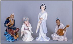 Collection Of Four Decorative Modern Oriental Figures Comprising two Geisha`s, A man playing a