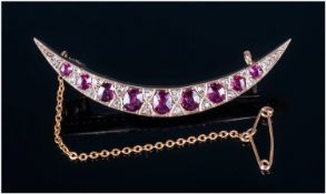 Victorian Gold Crescent Shaped Brooch Set With 9 Graduating Oval Rubies Between 18 Round Diamond