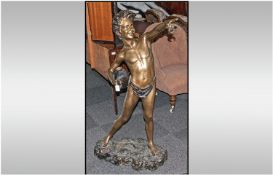 A Large Italian Bronze Of Neapolitan Fisher Boy semi clad, holding up a crab and carrying a jar in