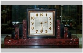 A Good Quality French Art Deco Marble Mantel Clock, with a Square Silvered Dial. Makers Name to the