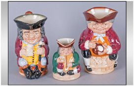 Three Royal Doulton Toby Jugs comprising 1. `Toby XX` 8337, 6.25`` in height, 2. `Jolly Toby` 8340,