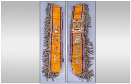 A Rare Orange Order Sash, with attached symbolic emblems relating to the orange order dated 1921.