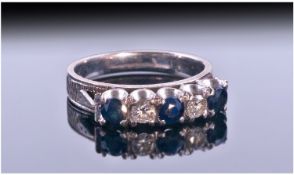 18ct White Gold Set Diamond And Sapphire 5 Stone Ring. The diamonds of good colour and clarity.