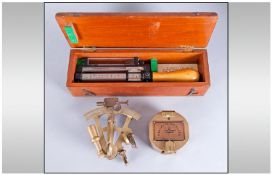 A Brass Pocket Compass, with a Miniature Pocket Sexton. With a Boxed Scale Spring Plunger, Made by