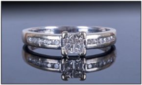 9ct White Gold Princes Cut Diamond Cluster Ring set with diamond shoulders. Diamond weight 33pts.