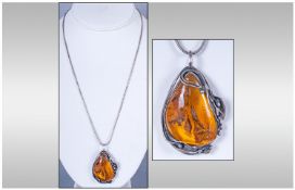 Large Amber Freeform Pendant With Foliate Applied Silver Mount, Polished Amber Stone. Stamped To