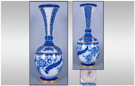 Macintyre Aurelian Ware Trumpet Vase. Circa 1900. Restoration and over painting to narrow central