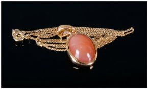 Peach Moonstone Solitaire Pendant, 7cts of oval cabochon cut peach moonstone in a bezel setting,