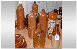 Collection of Stoneware Canisters 8 in total of Various Shapes and Sizes