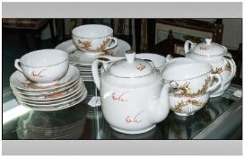 Japenese Tea Set Comprising Teapot, 2 HandledSugar Bowl, Six Cups and Saucers and 5 Side Plates