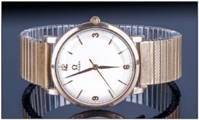 Omega Gents 9ct Gold Cased Wristwatch Mechanical wind. Circa 1960`s. Silver dial, gold batons.