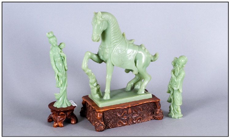 Three Jade Style Figures On Carved Wooden Plinths, One of a horse, one a sage & one a lady carrying