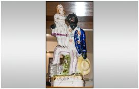 Staffordshire Mid 19th Century Figure `Uncle Tom & Eva` Circa 1852. 8.5`` in height, Crack to base,