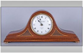 Knight & Gibbins Antique Style Mantle Clock, inlaid wooden case, brass bun feet, battery movement,(