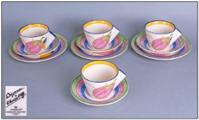 Set Of Four Wedgwood Clarice Cliff Bizarre Range Trios. One side plate missing.
