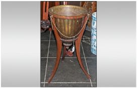 An Edwardian Mahogany Sheraton Style Plant Pot Stand, on Shaped Splayed Leg with Brass Liner.