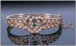 19thC Gold Hinged Bangle, The Embellished front Mounted With Seed Pearls, Central Green