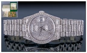Gents 18ct Gold Rolex Day-Date Wristwatch. Aftermarket   Diamond set dial, bezel and bracelet .