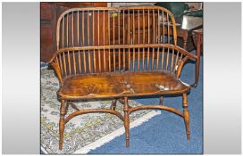 A Fine Quality Ash/Elm Reproduction Double Backed Windsor Armchair, supported by crinoline