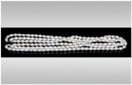 Cultured Fresh Water White Pearl Three Row Necklace, three graduated rows of ovoid white pearls,