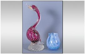 Murano Style Bubble Glass Bird Figure, with elongated neck and large beak, in plum colour, on a