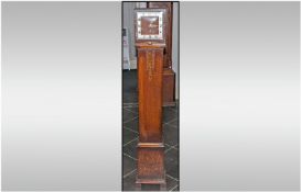 1920/1930`s Deco Style Oak Grandmother Clock, Westminster Chime, with a three hole dial. Square