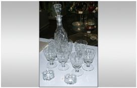 Glass Decanter- Star cut base, together with 7 Wine Glasses and 2 Candlestick Holders.