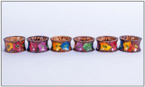 Set Of 6 Wood Poker Work Napkin Rings, decorated with coloured leaves and berries. Circa 1920s