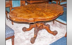 Large Victorian Serpentine Shaped Top Loo Table, the top veneered in burl walnut panels of fine