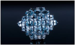 Sky Blue Topaz Cluster Ring, 12.5cts of oval cut, clear, sparkling topaz, closely set in a large