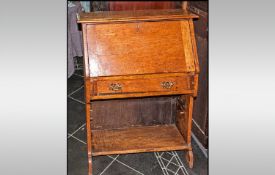 Golden Oak Fall Front Bureau, with drawer above storage space below. 43 inches high by 30 inches