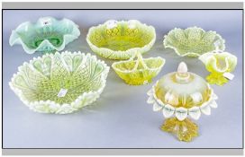 Seven Pieces Of Yellow Pressed Vaseline Glass Comprising 3 bowls, plate & 3 various cases.