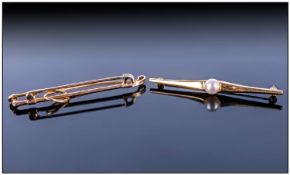 9ct Gold Riding Crop Brooch, hallmarked, plus good quality yellow metal solitaire pearl bar brooch,