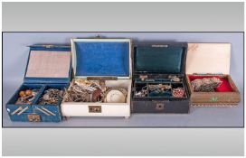 Four Jewellery Boxes Containing a quantity of costume jewellery, beads, earrings, necklaces etc.