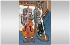 Two Modern Resin Figures Of Black Jazz Players, one playing a double bass, one singing. 39`` in
