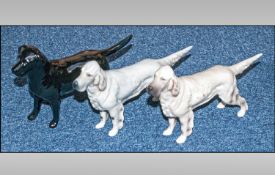 Three Beswick Dog Figures Comprising Two Model Number 973, English Setter `Bayldon Baronet` in matt