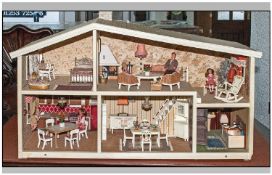Two Storey Dolls House. Furnished, with glued down furniture, each room furnished. Comes with a